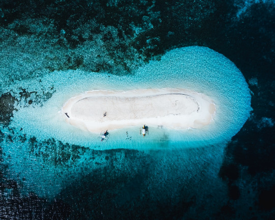 An aerial view of an island in the ocean