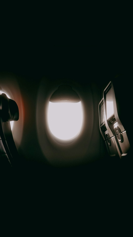 a view of the inside of an airplane window