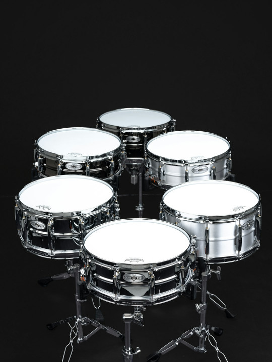 A group of drums sitting on top of each other