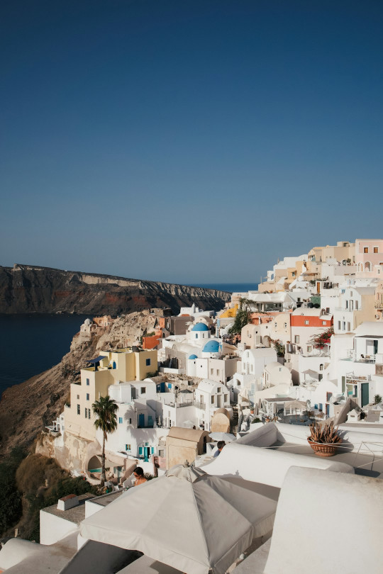 A view of a village on the edge of a cliff