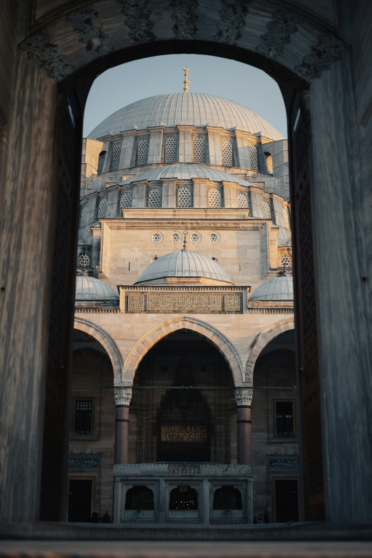 A view of a building through a doorway
