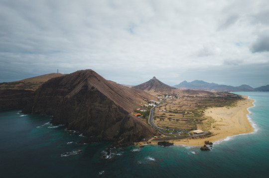 An aerial view of a small island in the middle of the ocean