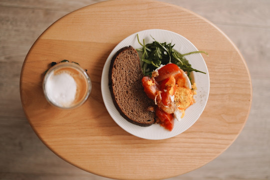 A plate of food on a wooden table