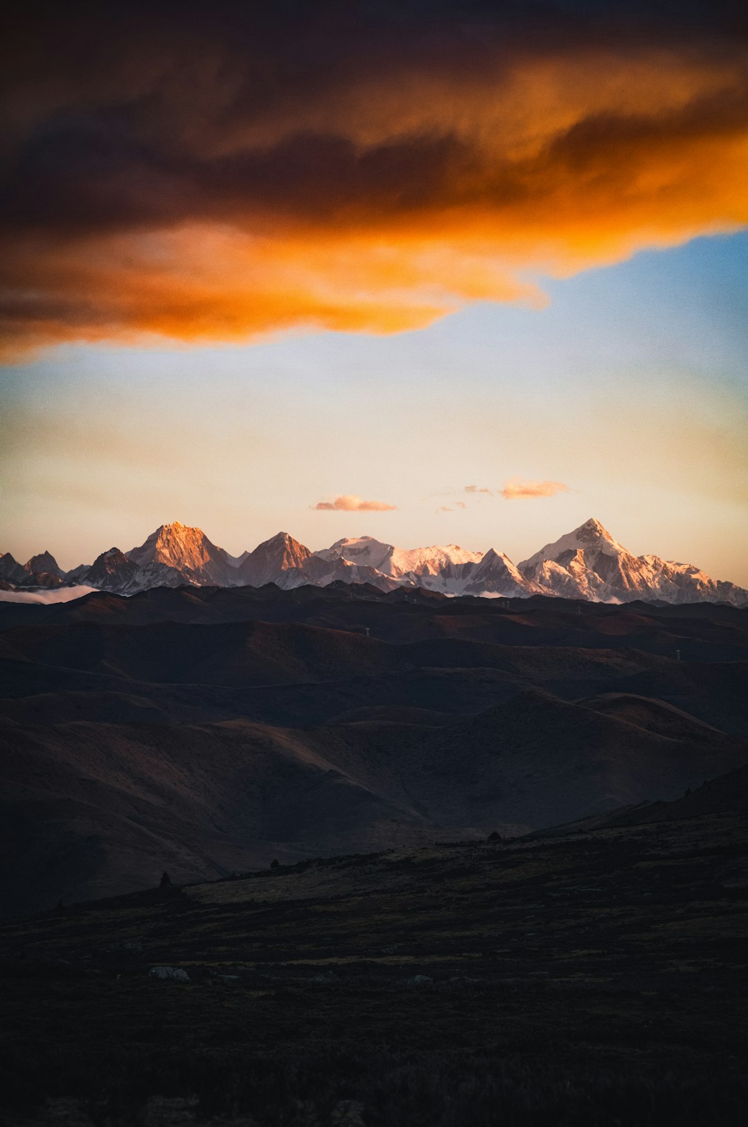 A view of a mountain range at sunset