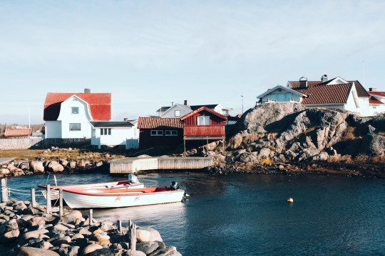 A small boat in a body of water