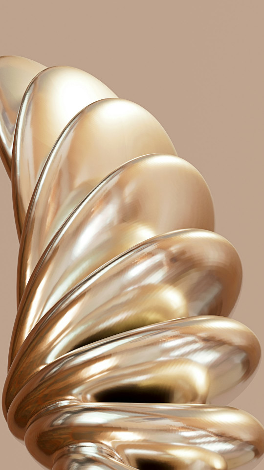 A golden spiral object with a brown background