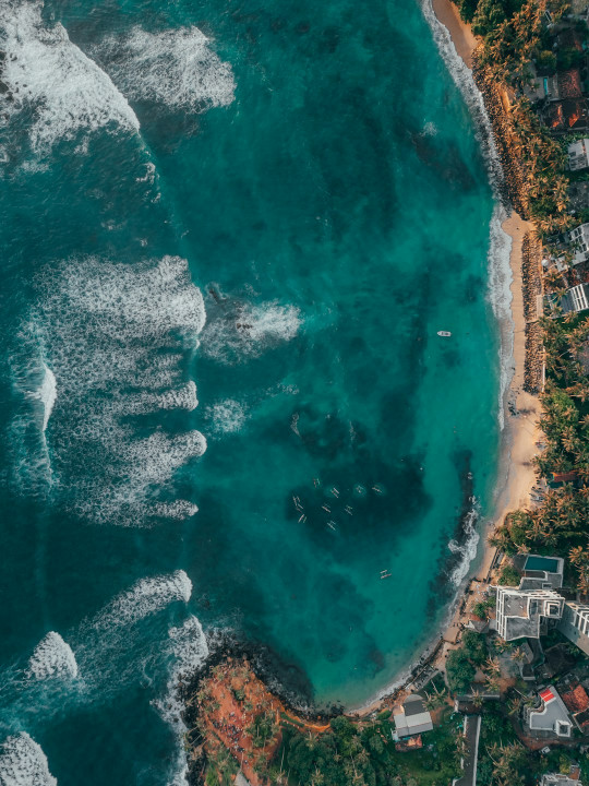 An aerial view of a beach and ocean