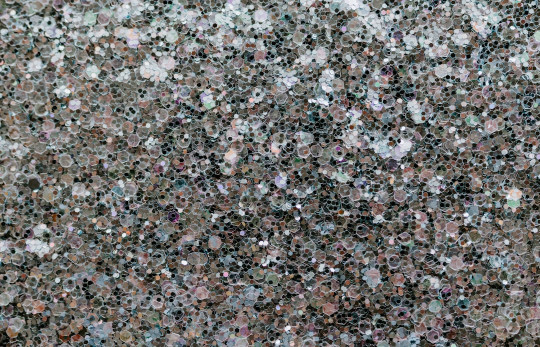 A close up of a black and white speckled surface