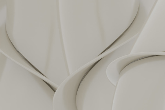 A close up of a white wall with a curved design