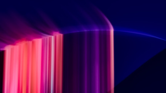 A blurry image of a purple and blue background