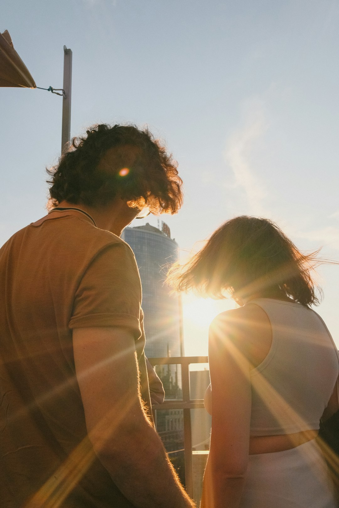 a man and a woman standing next to each other