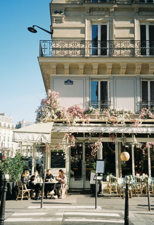 A building that has a bunch of flowers on it