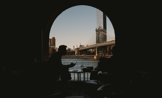 A view of a city from a window in a building