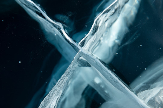 A close up of a liquid pouring out of a bottle