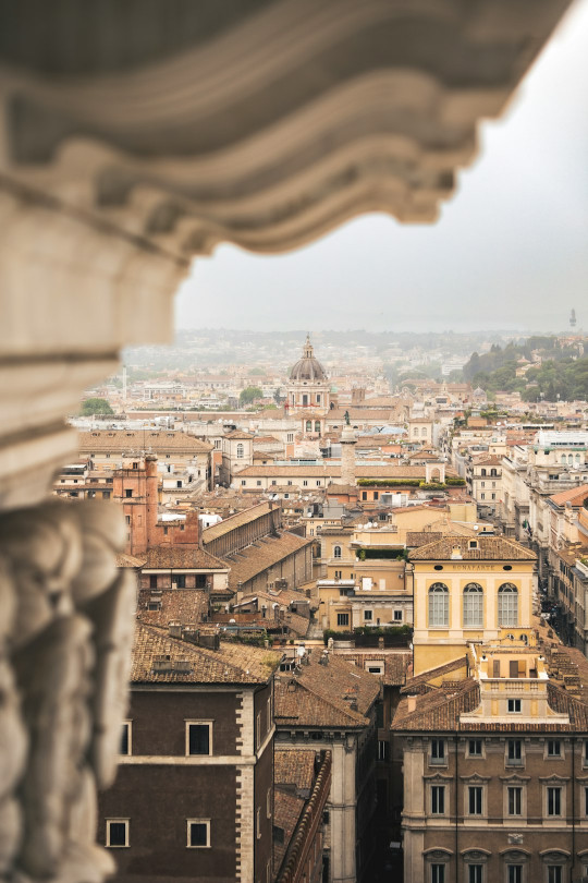 A view of a city from the top of a building