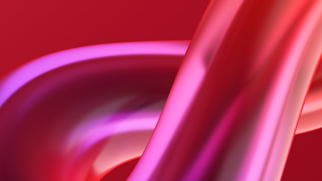 A close up of a red and pink background