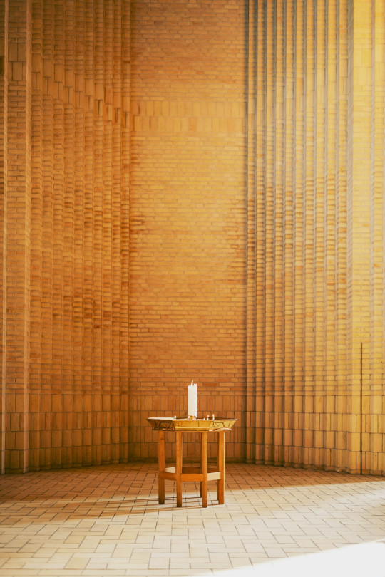 A room with a table and a chair in it