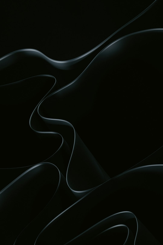 An abstract black background with wavy lines