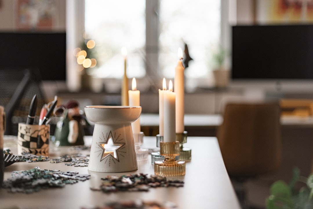 A living room filled with lots of furniture and candles